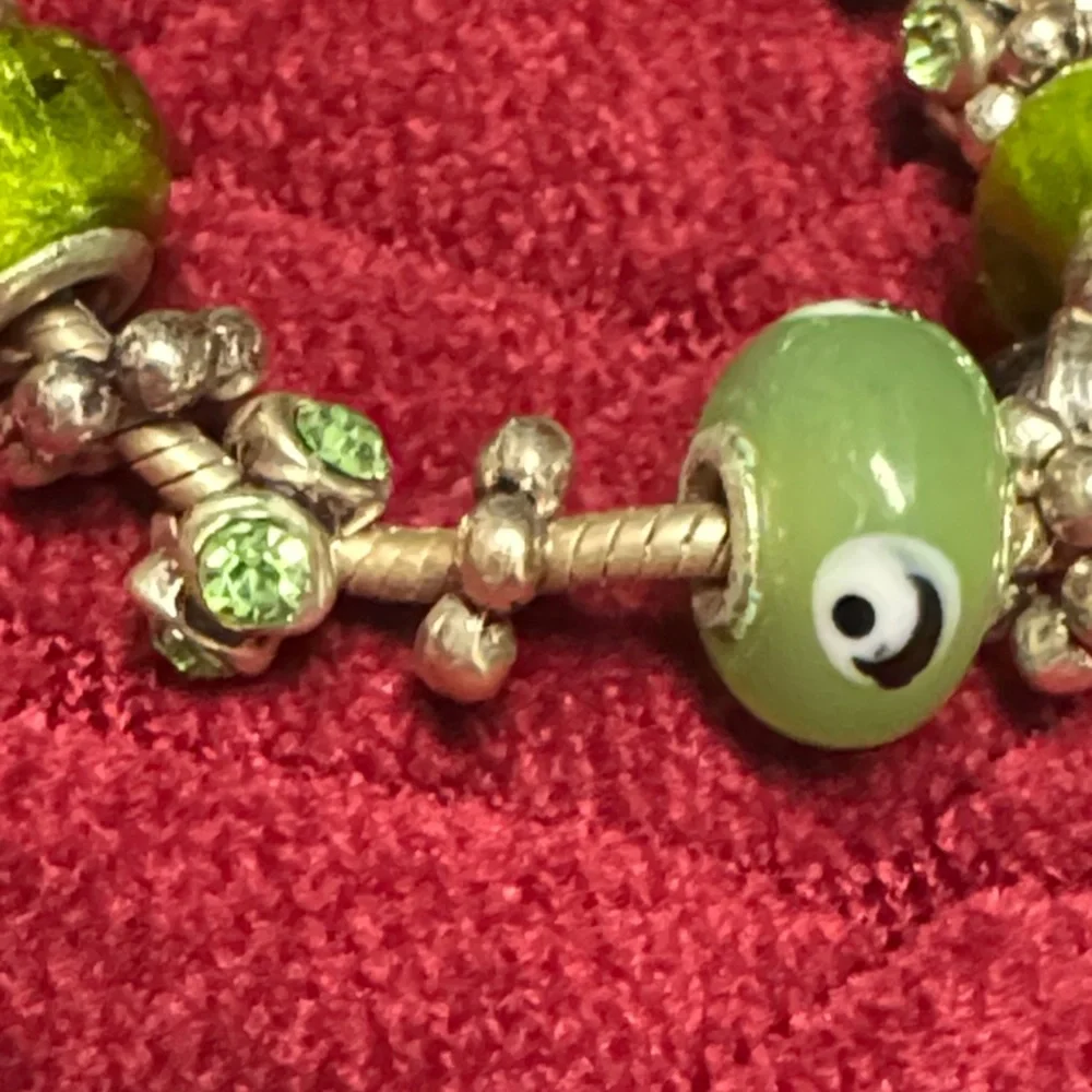 2 glass Bead and Elegant Silver Bracelets. In great condition.